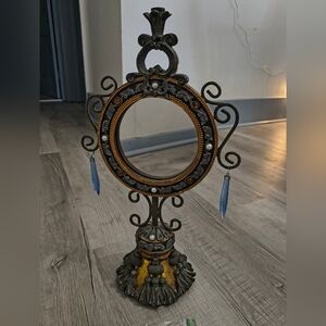 Ornate Black and Gold Decorative Stand